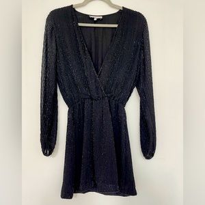 Black beaded short dress.